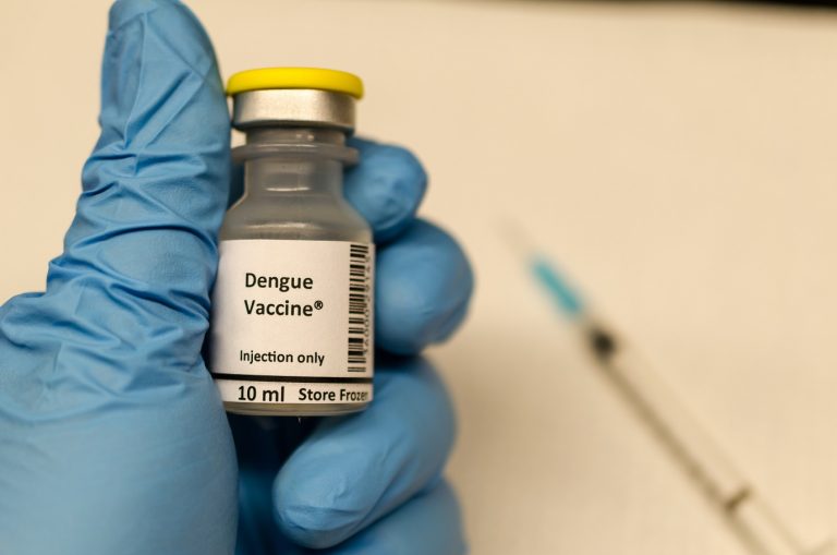 blue gloves and dengue vaccine