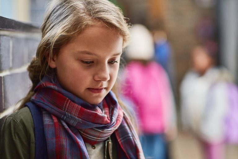 young girl wearing a scarf