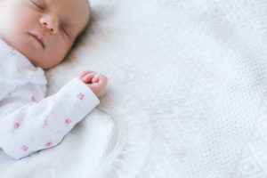a newborn has a healthy day's sleep