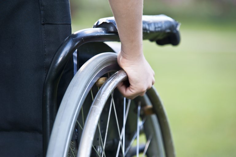 a boy in a wheelchair