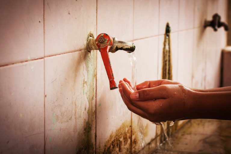 catching water from faucet