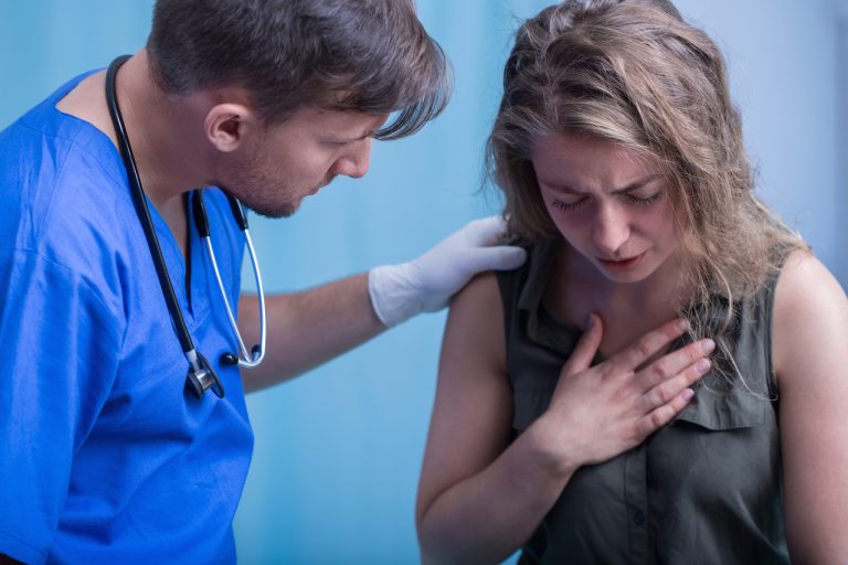 woman having trouble breathing