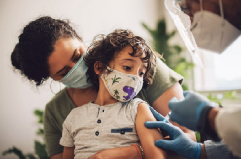 young girl getting vaccinated