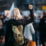 woman and others protesting