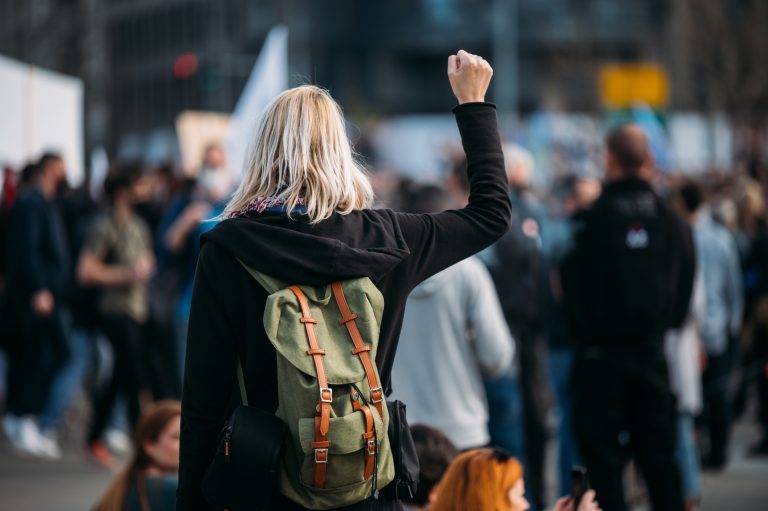 woman and others protesting