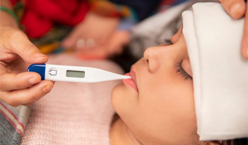 taking child's temperature