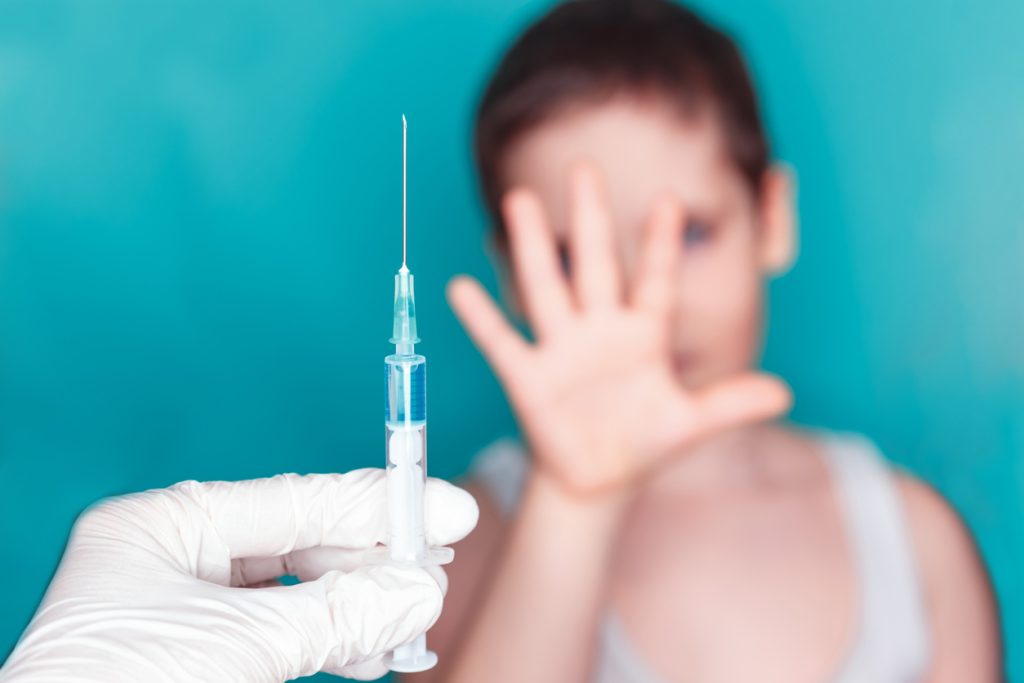 person rejecting vaccine